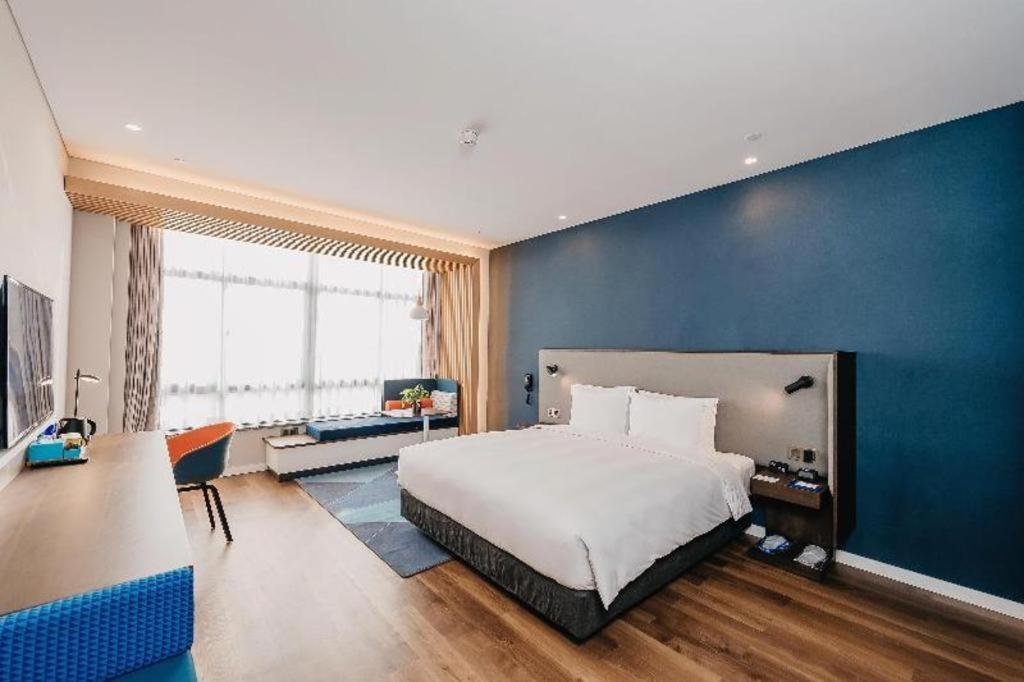 Holiday Inn Taizhou Cmc Екстериор снимка